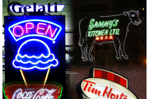 What is the difference between an electric sign and a 'lightbox'?